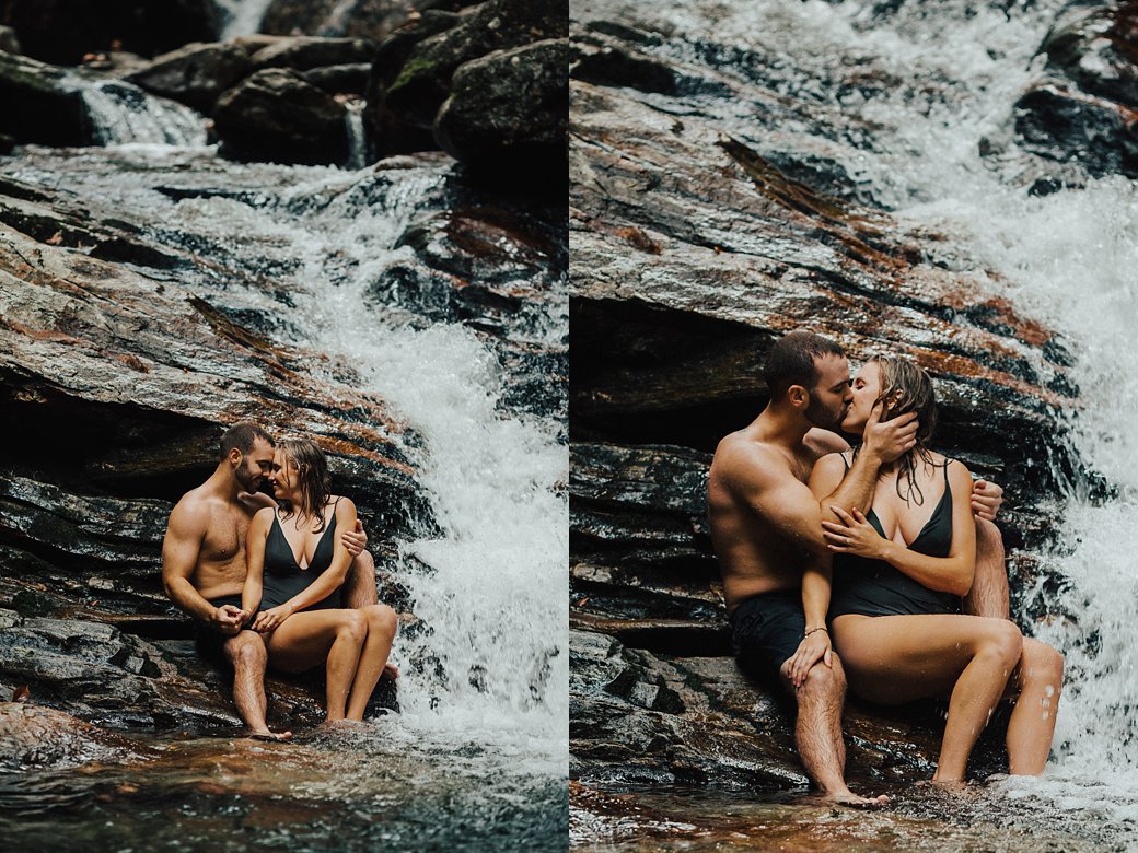 Tess and Carson kissing under waterfall 