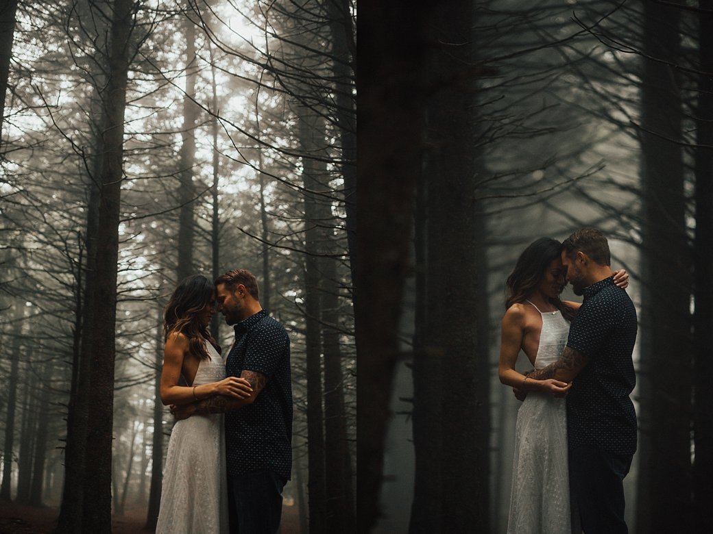 couple standing together in forest at Black Balsam 