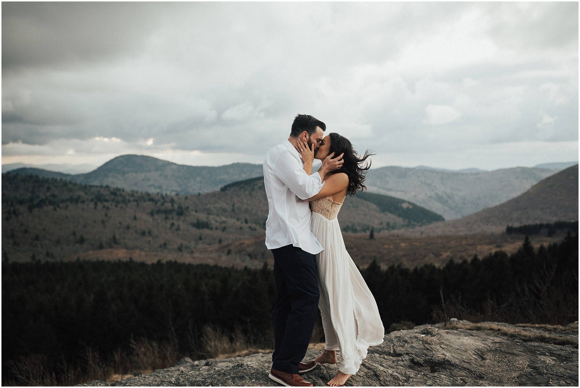 Ashley and Aaron kissing at their Black Balsam Engagement session