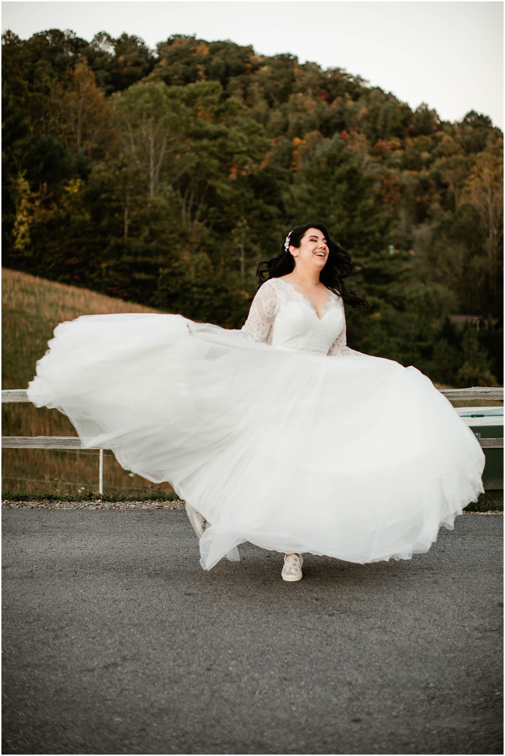 bride twirling in wedding dress at chestnut ridge