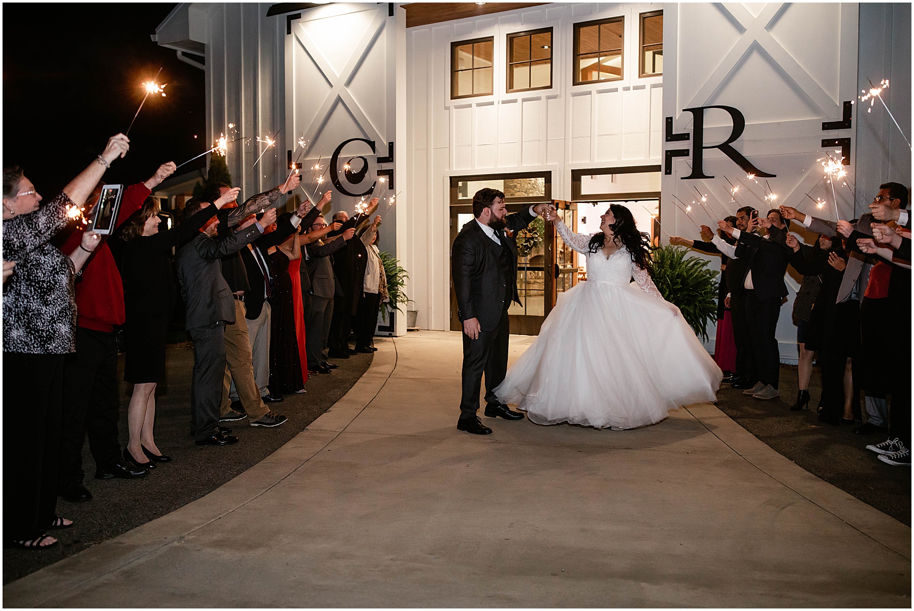 bride and groom's sparkler exit at nc wedding reception
