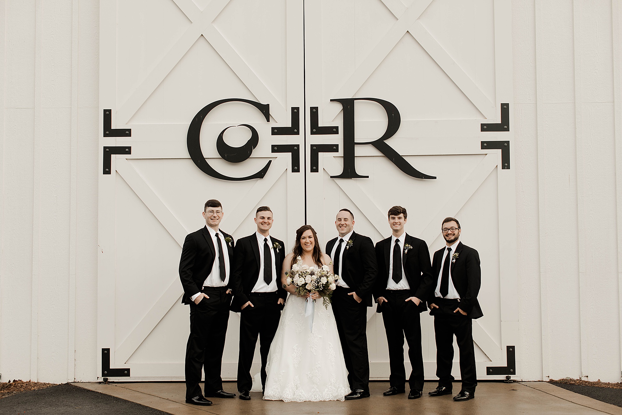 bride with groomsmen at Chestnut Ridge