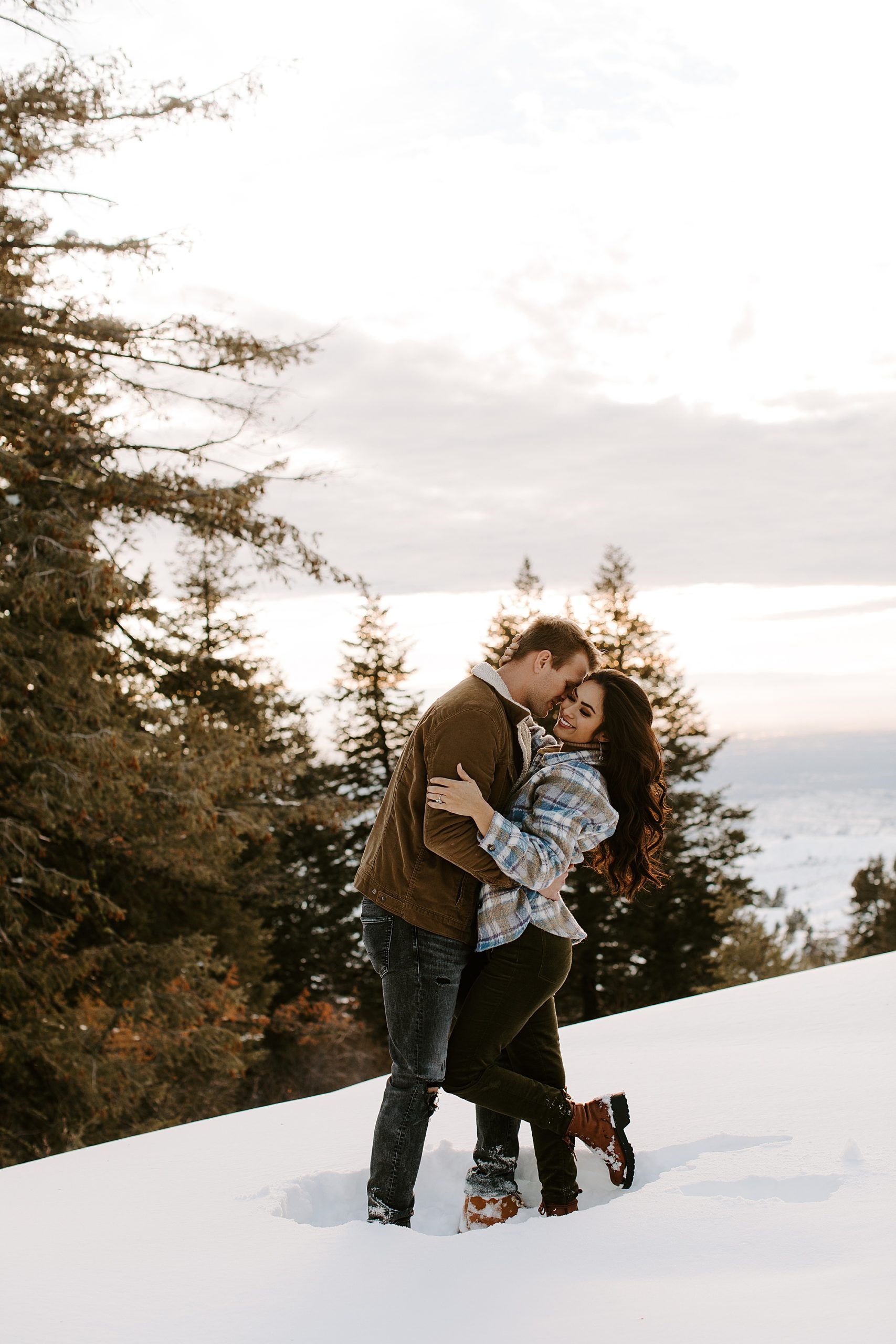 snowy engagement session, snowy engagement photoshoot, snowy couple pictures, snowy couple photos, snowy couple, snowy couple aesthetic, snowy couple photography, snowy mountain couple photos, snowy mountains couple photography, stack rock idaho, sawtooth mountains idaho, sawtooth mountains, sawtooth mountains engagement session, sawtooth mountains engagement photos, boise idaho, boise idaho engagement session, boise engagement session, idaho engagement session, idaho couples session, idaho couples photography, plaid shirt outfits, engagement session, couples session, couples photoshoot, couples photography, couples photoshoot outfit ideas, couples photoshoot outfits, couple photos, couple photography, engagement photoshoot ideas